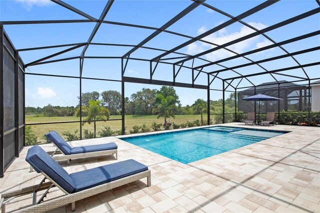 15049 Canopy Cover Dr, Winter Garden, FL 34787 - swimming pool featuring a patio area and a lanai