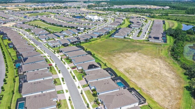 15049 Canopy Cover Dr, Winter Garden, FL 34787 - aerial view of property's location featuring nearby suburban area and a large body of water