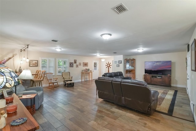 704 Tangerine Ct, Winter Garden, FL 34787 - living area featuring wood finished floors and baseboards