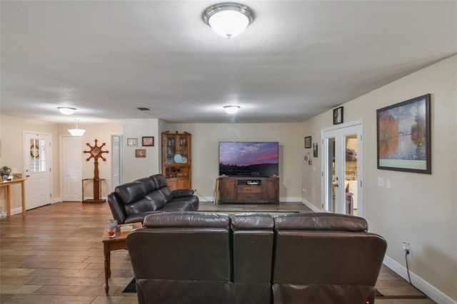 704 Tangerine Ct, Winter Garden, FL 34787 - living room featuring wood finished floors and baseboards
