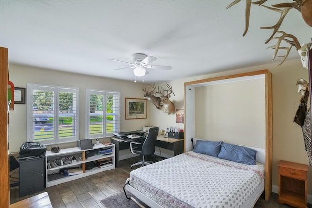 704 Tangerine Ct, Winter Garden, FL 34787 - bedroom with an office area, hardwood / wood-style flooring, and ceiling fan