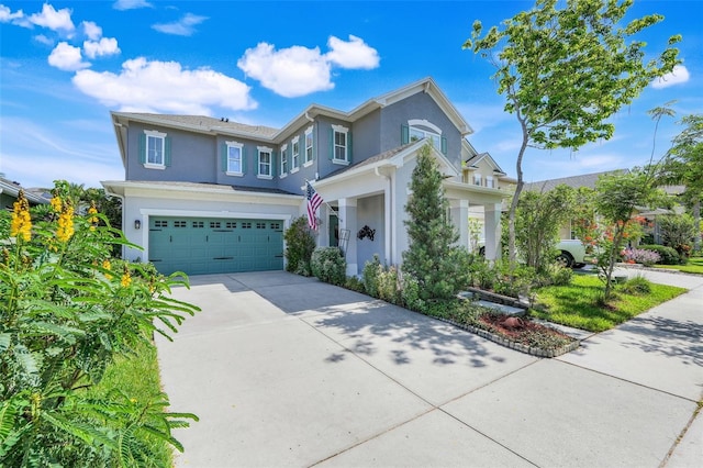 13822 Darchance Rd, Windermere, FL 34786 - traditional home featuring stucco siding, driveway, and a garage