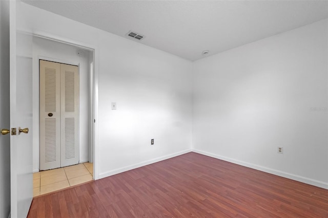 2750 King Oak Cir, Saint Cloud, FL 34769 - empty room with wood finished floors and baseboards