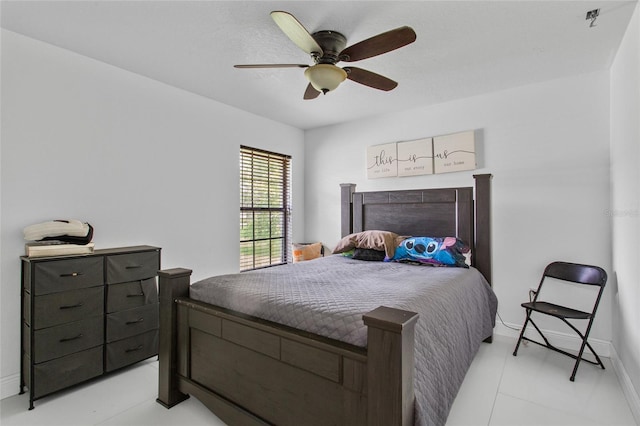 4905 Emilee Grace Ln, Saint Cloud, FL 34771 - bedroom featuring ceiling fan, baseboards, and light tile patterned flooring