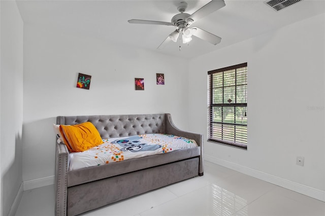 4905 Emilee Grace Ln, Saint Cloud, FL 34771 - tiled bedroom featuring baseboards and a ceiling fan