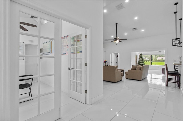 4905 Emilee Grace Ln, Saint Cloud, FL 34771 - living room featuring ceiling fan, recessed lighting, arched walkways, and baseboards