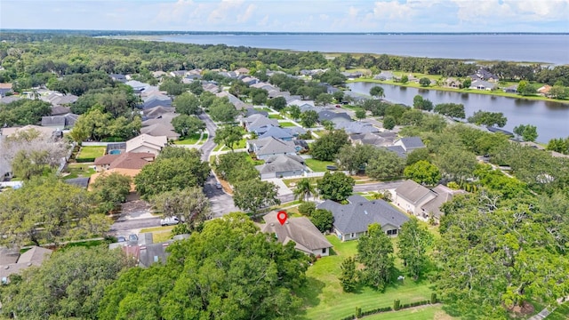 4905 Emilee Grace Ln, Saint Cloud, FL 34771 - aerial perspective of suburban area featuring a large body of water