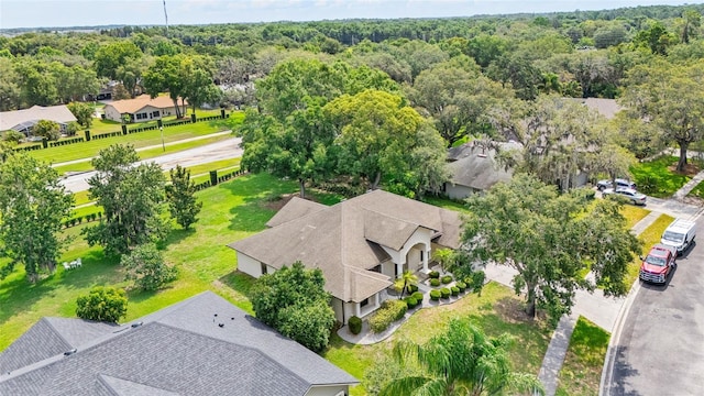 4905 Emilee Grace Ln, Saint Cloud, FL 34771 - aerial perspective of suburban area with a heavily wooded area