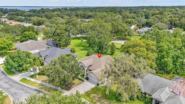 4905 Emilee Grace Ln, Saint Cloud, FL 34771 - aerial perspective of suburban area with a heavily wooded area