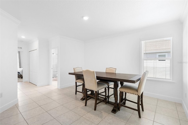 15356 White Tail Loop, Mascotte, FL 34753 - dining space featuring crown molding, baseboards, light tile patterned floors, and recessed lighting