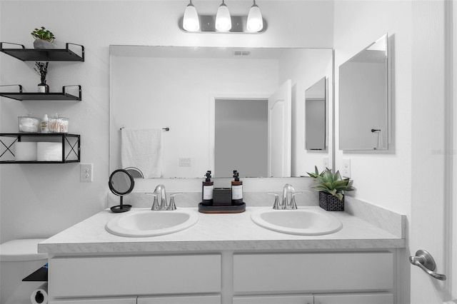 15356 White Tail Loop, Mascotte, FL 34753 - full bath with double vanity and toilet