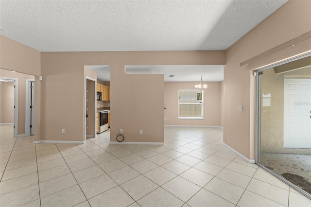 476 Basking Ridge Ct, Ocoee, FL 34761 - unfurnished room featuring a chandelier, a textured ceiling, light tile patterned floors, and baseboards