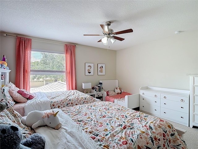 18109 Kara Ct, Tampa, FL 33647 - carpeted bedroom with a textured ceiling and ceiling fan