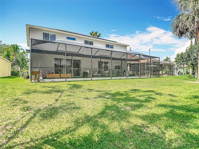 18109 Kara Ct, Tampa, FL 33647 - rear view of house featuring a patio, stucco siding, and a yard