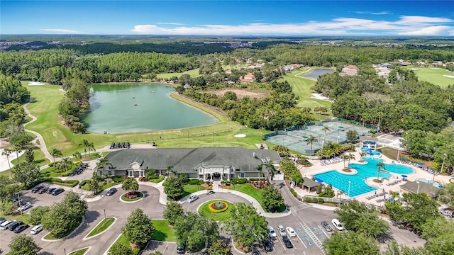 18109 Kara Ct, Tampa, FL 33647 - aerial view of a nearby body of water, a heavily wooded area, a golf course, and a pool area