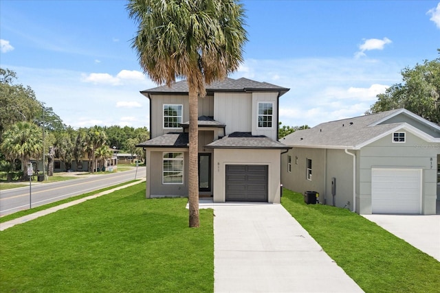 811 E Mcdonald Ave, Eustis, FL 32726 - view of front of house featuring a front lawn, driveway, and cooling unit
