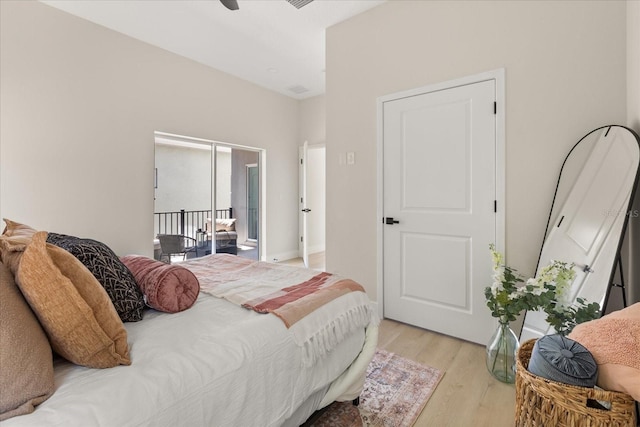 811 E Mcdonald Ave, Eustis, FL 32726 - bedroom with light wood-style flooring and access to exterior