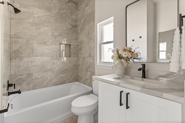 811 E Mcdonald Ave, Eustis, FL 32726 - full bathroom featuring vanity, toilet, healthy amount of natural light, and shower / tub combination