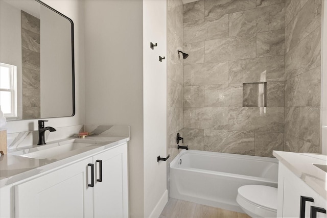 811 E Mcdonald Ave, Eustis, FL 32726 - bathroom with vanity, toilet, shower / bath combination, and baseboards