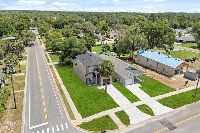 811 E Mcdonald Ave, Eustis, FL 32726 - aerial view of residential area with a heavily wooded area