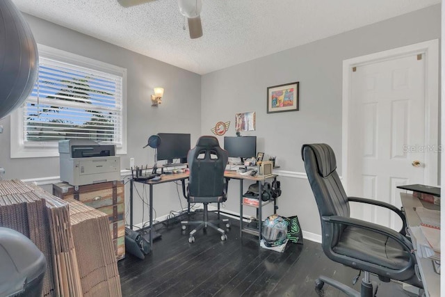 232 E Grant St, Orlando, FL 32806 - home office featuring wood finished floors, ceiling fan, a textured ceiling, and baseboards
