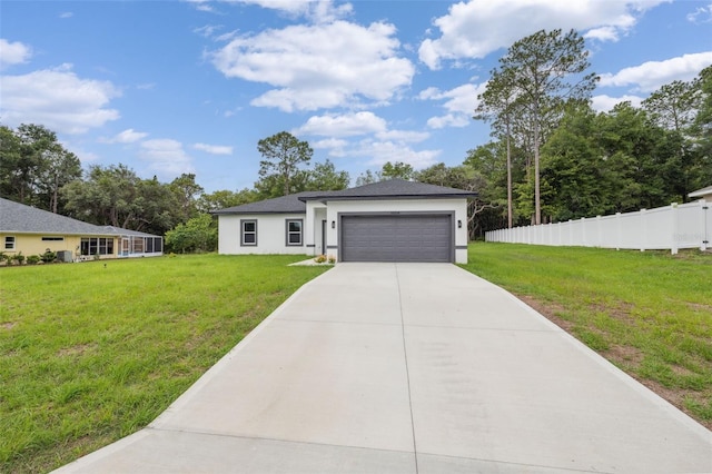 10218 N Langdon Rd, Citrus Springs, FL 34434 - view of front of home featuring driveway, an attached garage, and stucco siding