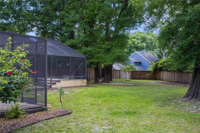 2009 Woody Dr, Windermere, FL 34786 - view of yard featuring glass enclosure