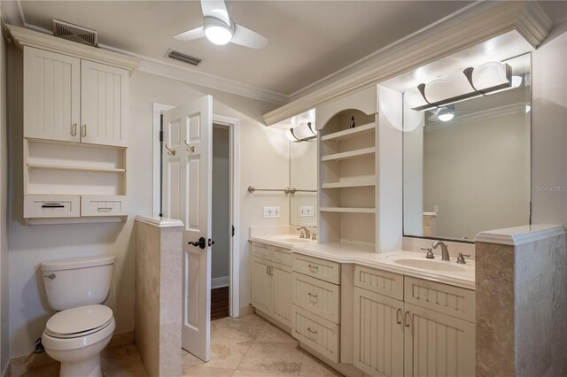 2009 Woody Dr, Windermere, FL 34786 - bathroom with double vanity, crown molding, tile patterned flooring, ceiling fan, and toilet