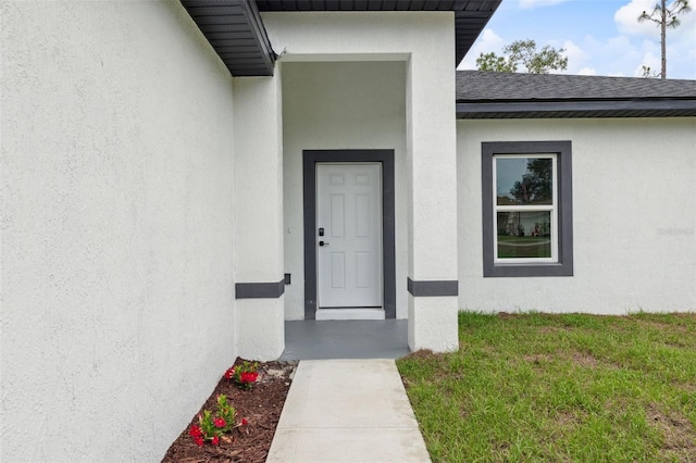 2565 W Laredo Dr, Citrus Springs, FL 34433 - entrance to property with stucco siding and roof with shingles