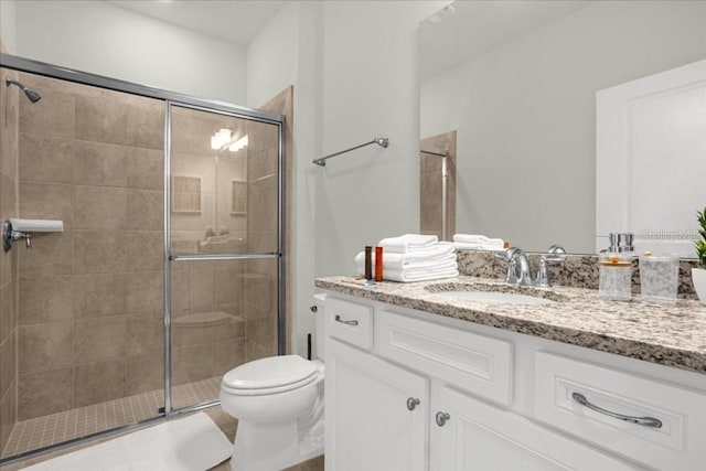 4310 Lana Ave, Davenport, FL 33897 - full bathroom featuring vanity, toilet, and a shower stall