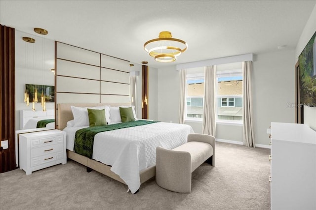4310 Lana Ave, Davenport, FL 33897 - bedroom with light carpet, a chandelier, and baseboards
