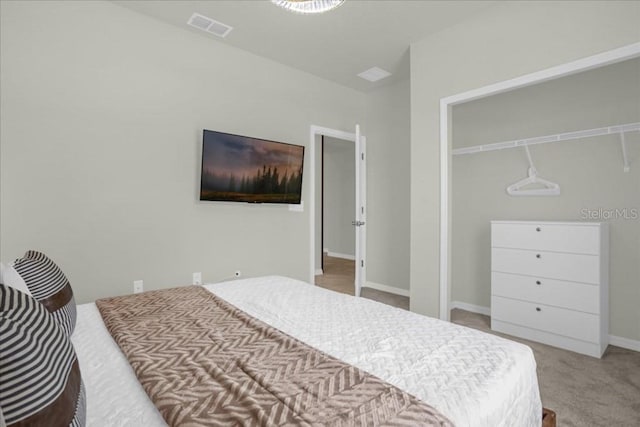 4310 Lana Ave, Davenport, FL 33897 - bedroom with carpet floors, a closet, and baseboards