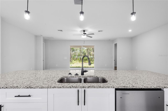 30369 Apricot Ave, Eustis, FL 32736 - kitchen featuring ceiling fan, white cabinetry, refrigerator, light stone countertops, and recessed lighting