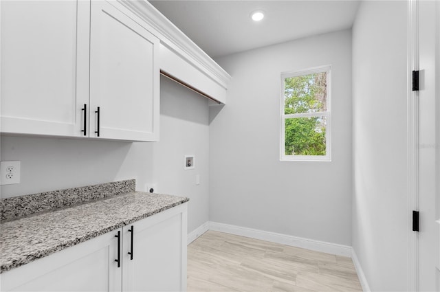 30369 Apricot Ave, Eustis, FL 32736 - laundry room with hookup for a washing machine, cabinet space, electric dryer hookup, and recessed lighting