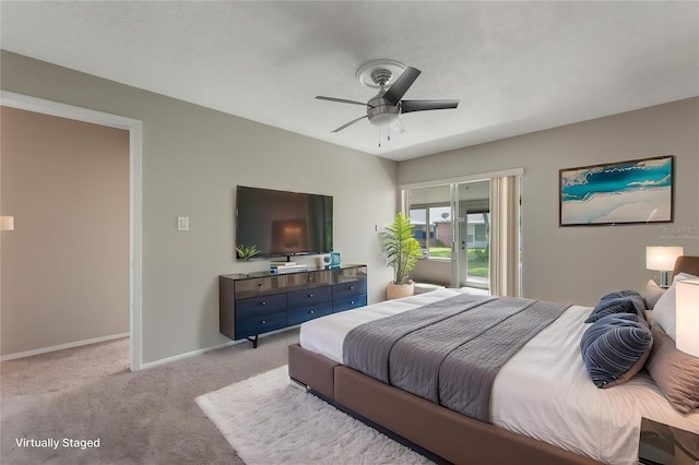 1230 Americana Pl, Orlando, FL 32807 - bedroom with light carpet, baseboards, ceiling fan, and access to exterior