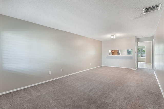 1230 Americana Pl, Orlando, FL 32807 - carpeted empty room featuring a textured ceiling and baseboards