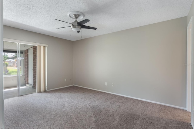 1230 Americana Pl, Orlando, FL 32807 - unfurnished room with carpet, a ceiling fan, a textured ceiling, and baseboards
