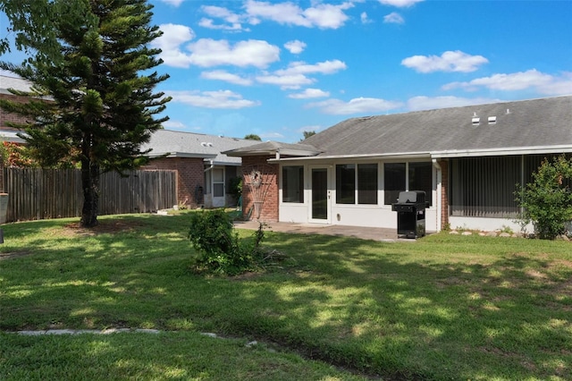 1230 Americana Pl, Orlando, FL 32807 - rear view of property featuring brick siding and a sunroom
