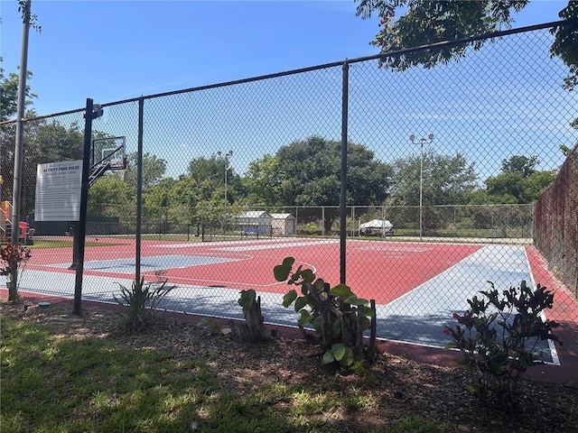 1230 Americana Pl, Orlando, FL 32807 - view of tennis court with community basketball court