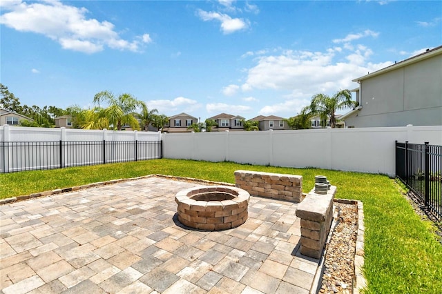 3883 Crawley Down Loop, Sanford, FL 32773 - view of patio / terrace with a fire pit and a residential view