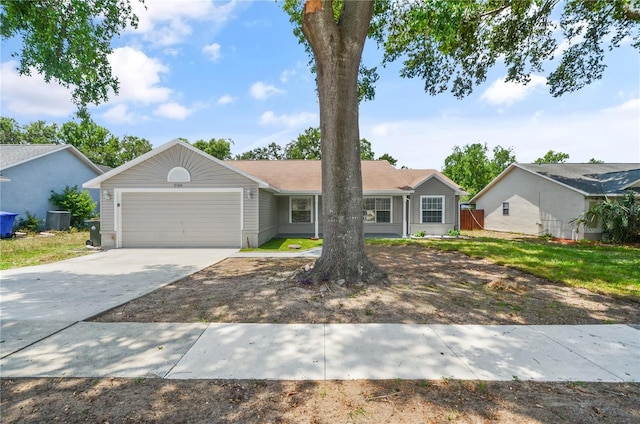 5160 Wood Ridge Ct, Ocoee, FL 34761 - single story home featuring a garage, cooling unit, and concrete driveway
