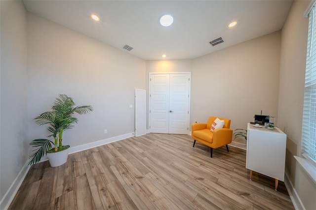 16055 Silver Brook Way, Winter Garden, FL 34787 - living area featuring light wood-style floors, baseboards, and recessed lighting