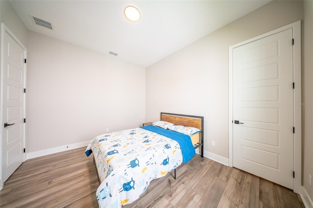 16055 Silver Brook Way, Winter Garden, FL 34787 - bedroom with wood finished floors and baseboards