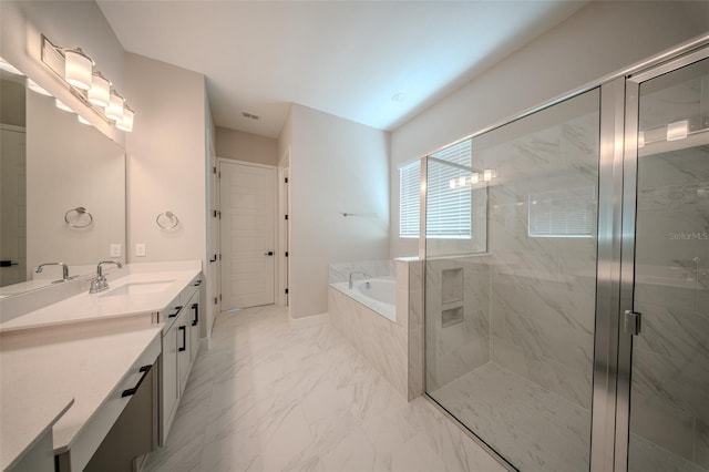 16055 Silver Brook Way, Winter Garden, FL 34787 - bathroom with vanity, a bath, marble look tile flooring, and a marble finish shower