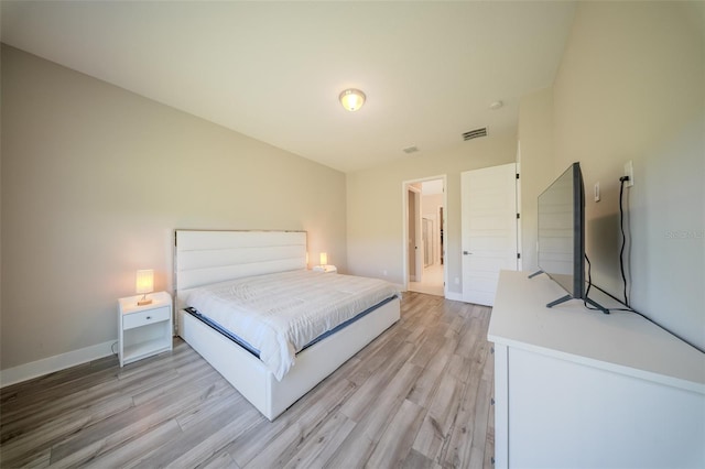 16055 Silver Brook Way, Winter Garden, FL 34787 - bedroom with light wood-type flooring and baseboards