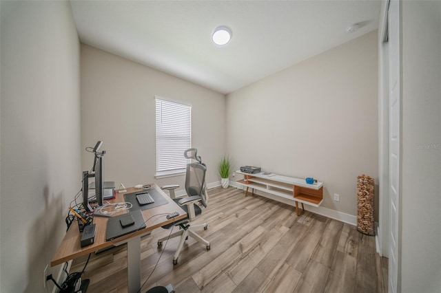 16055 Silver Brook Way, Winter Garden, FL 34787 - office area with light wood finished floors and baseboards