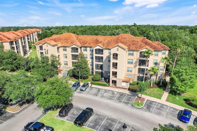 1375 Tuscana Ln Unit 1102, Davenport, FL 33896 - drone / aerial view of a heavily wooded area