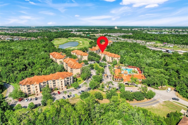 1375 Tuscana Ln Unit 1102, Davenport, FL 33896 - bird's eye view of apartment complex, a large body of water, and a local golf course