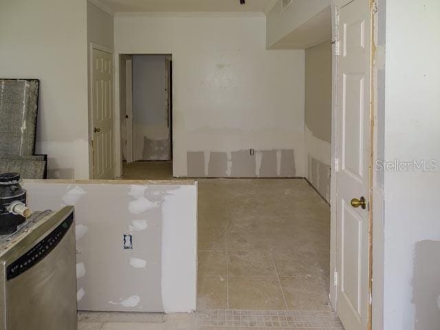 9584 Lake Chase Island Way Unit 958, Tampa, FL 33626 - bathroom with ornamental molding and tile patterned floors
