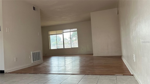 2235 Silver Pines Pl Unit 401, Orlando, FL 32808 - spare room featuring light tile patterned flooring and baseboards